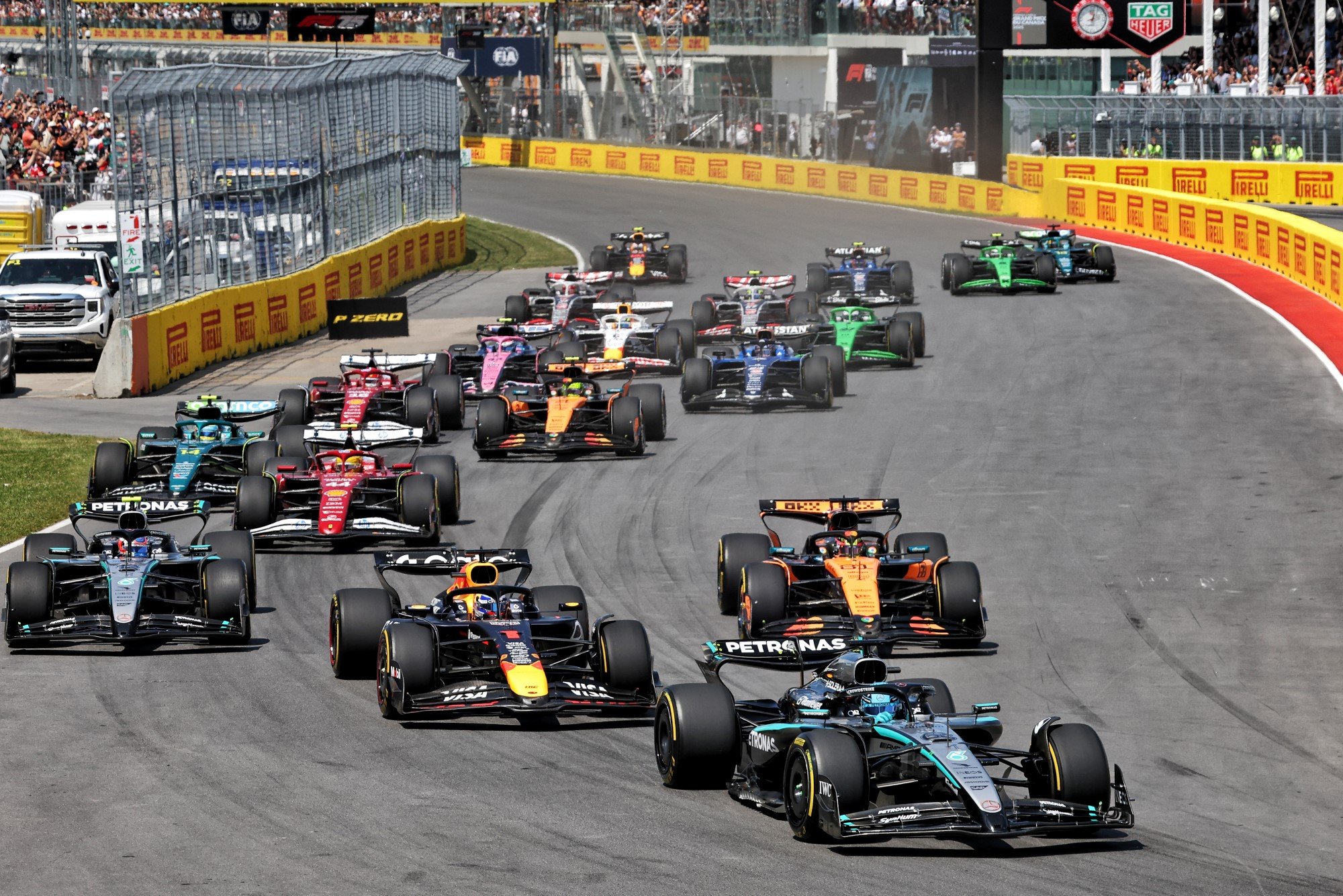 George Russell (GBR) Mercedes AMG F1 W16 leads at the start of the race.
